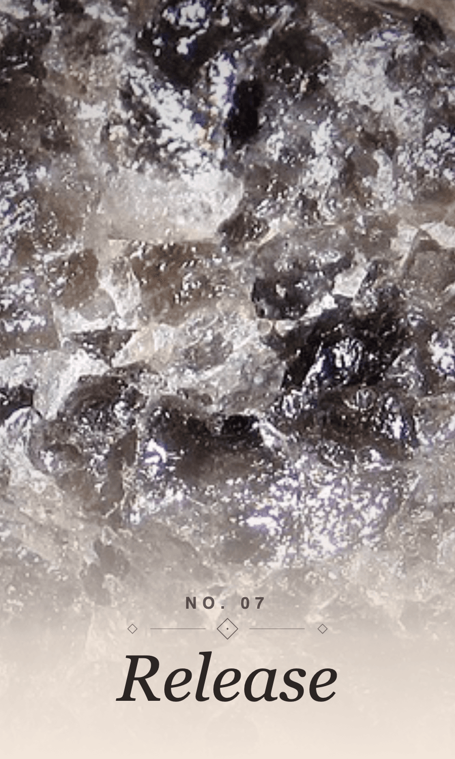 The Facet Deck card 'Release' — a close photograph of smoky quartz.